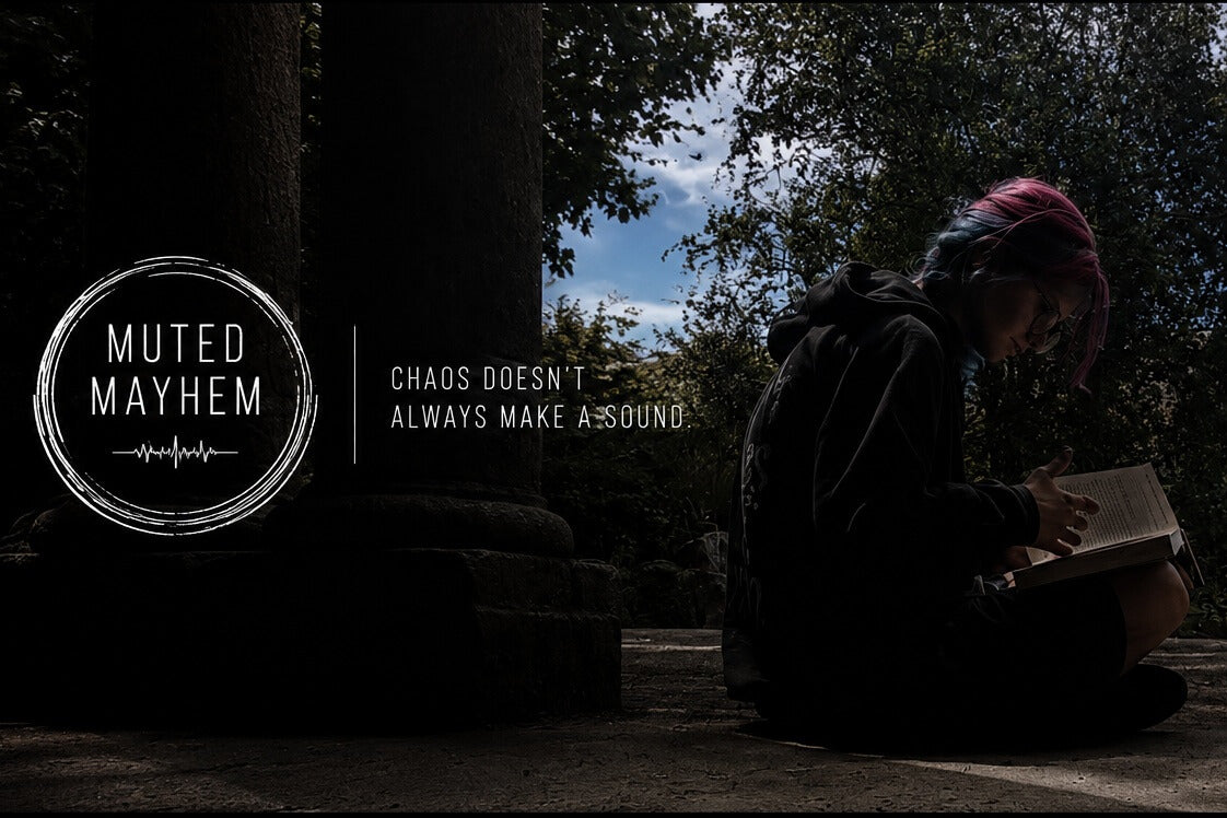 A dark promotional graphic with the text 'MUTED MAYHEM' and 'CHAOS DOESN'T ALWAYS MAKE A SOUND.' on the left, and a person sitting outdoors reading a book on the right.