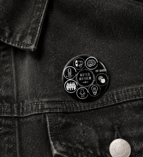 Six-panel collage showing a small round black enamel pin with white icons and text, including 'WATER WORTH' and 'MY BRAND', attached to different clothing items and held in a hand.
