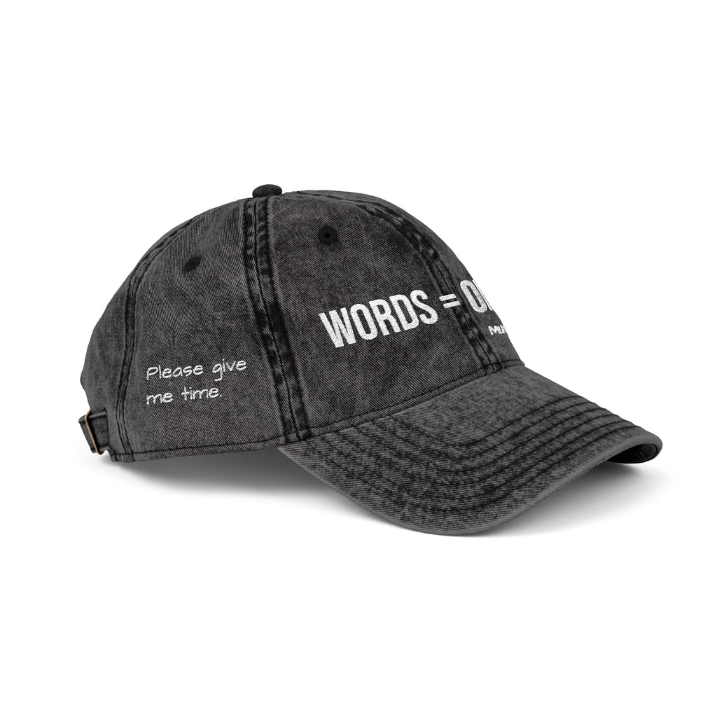 Black vintage cap with Please give me time and words = offline embroidery on it